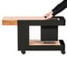 An Astella black mobile outdoor bar on wheels.