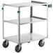 A Regency stainless steel utility cart with three shelves and wheels.