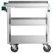 A Regency stainless steel utility cart with three shelves and wheels.