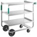 A Regency three-shelf stainless steel cart with black wheels.