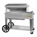 a silver barbecue grill with wheels