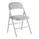 A gray vinyl folding chair with a padded seat and backrest.