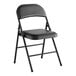 A black vinyl folding chair with a padded seat and backrest.