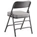 a gray folding chair with a black frame