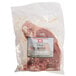 A package of Warrington Farm Meats T-Bone steaks on a white surface.