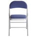 a blue and white folding chair