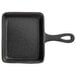 A black cast iron pan with a handle.