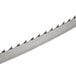 A close-up of a 98" band saw blade with sharp teeth.