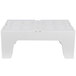 A white plastic surface with slotted holes.
