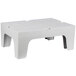 A white plastic slotted top for a Cambro Bow Tie Dunnage Rack.