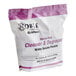 A white and purple Noble Chemical bag of 36 QuikPacks for heavy duty cleaner and degreaser.