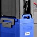 A blue CaterGator insulated beverage dispenser with a black lid on a counter.