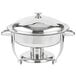 A silver metal Vollrath Orion chafer with a lid on a table.