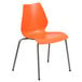 An orange plastic Flash Furniture stack chair with metal legs.