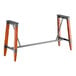 Lancaster Table & Seating Industrial Rustic Mahogany table trestle with metal and wood legs.