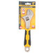 A yellow and black Olympia Tools adjustable wrench with a molded handle in a package.