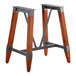 Lancaster Table & Seating bar height trestle table base with wooden legs and metal supports.