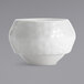 A white porcelain bouillon bowl with a textured rim.