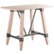 A Lancaster Table & Seating bar height wooden table with legs.