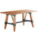 A Lancaster Table & Seating wooden table with metal legs.