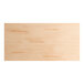 A rectangular solid wood table top with a bleached oak finish and a live edge design.