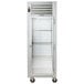 A white Traulsen G Series reach-in refrigerator with a right-hinged glass door.