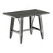 A rectangular solid wood table with a live edge and a trestle base, finished in slate gray.