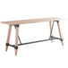 A Lancaster Table & Seating solid wood table with legs.