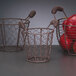 Three Libbey wire pails filled with red apples.