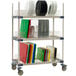 A MetroMax 4 metal rack with trays holding different colored plates.