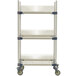 A white MetroMax 4 mobile three tier tray drying rack on wheels.