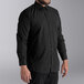A man wearing a Henry Segal black long sleeve dress shirt.