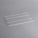 A white metal grid shelf for an Avantco deli case.