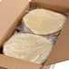 A box of Mission 10" flour tortillas wrapped in plastic.