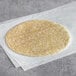 A Mission 10" flour tortilla on a white paper.