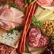 A platter of Piller's Black Kassel salami whips, ham, and cheese.