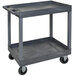 a grey plastic cart with wheels