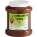 a container of brown liquid