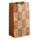 A brown paper Bagcraft Packaging bag with a white border and pattern of Artisan Print.