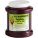 A container of I. Rice Red Raspberry topping.