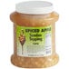 A plastic container of I. Rice Spiced Apple Sundae Topping with a white lid.