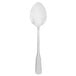 A silver spoon with a white handle on a white background.