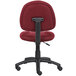 a red office chair with black wheels