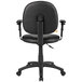 A Boss black Caressoft office chair with wheels and arms.