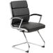 A Boss black leather office chair with chrome legs.