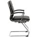 A Boss black CaressoftPlus executive guest chair with chrome legs.