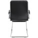 A Boss black CaressoftPlus executive guest chair with metal legs.