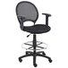 A Boss black mesh drafting stool with a black mesh back.