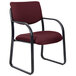 A burgundy Boss guest chair with black metal legs.