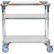 A Metro PrepMate MultiStation cart with galvanized shelves and blue wheels.